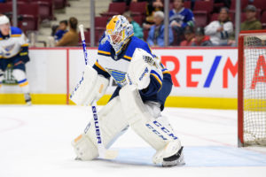 Jake Allen in St. Louis Blues crease stance wearing Bauer mask and Brian's pads during NHL game at Rogers Arena