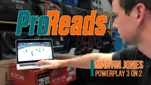 Martin Jones watches goalie video analysis on a laptop during a ProReads powerplay 3-on-2 breakdown session