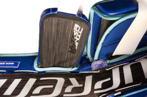 Bauer Supreme UltraSonic goalie pad knee stack detail showing blue and carbon fiber construction