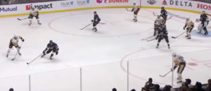 Cal Petersen in goal tracking play as Vegas Golden Knights and Winnipeg Jets players battle in the offensive zone