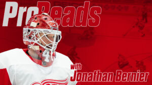 Jonathan Bernier in Detroit Red Wings gear wearing red helmet and white jersey for ProReads instructional series graphic