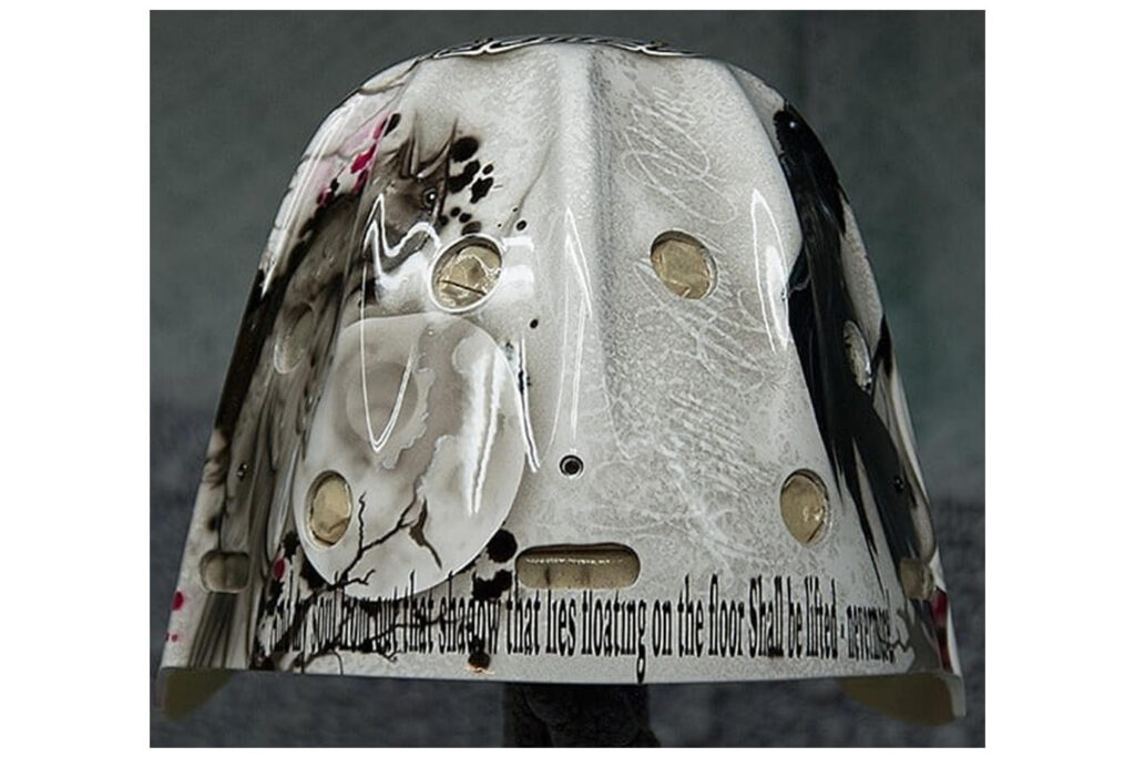 Roberto Luongo Halloween-themed goalie mask with horror artwork and text detail, white base with dark ink graphics