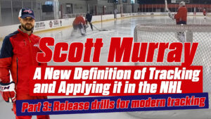 Goalie coach Scott Murray on ice during NHL tracking drill session, players visible in background near net