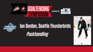 Ian Gordon, Seattle Thunderbirds goalie coach, demonstrates puckhandling technique on ice during WHL Goaltending Symposium
