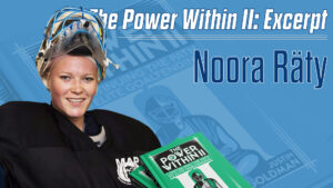 Finnish goalie Noora Räty smiling and holding a copy of The Power Within II book
