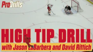 Calgary Flames goalie David Rittich in crease during high tip drill with Jason LaBarbera, aerial overhead view