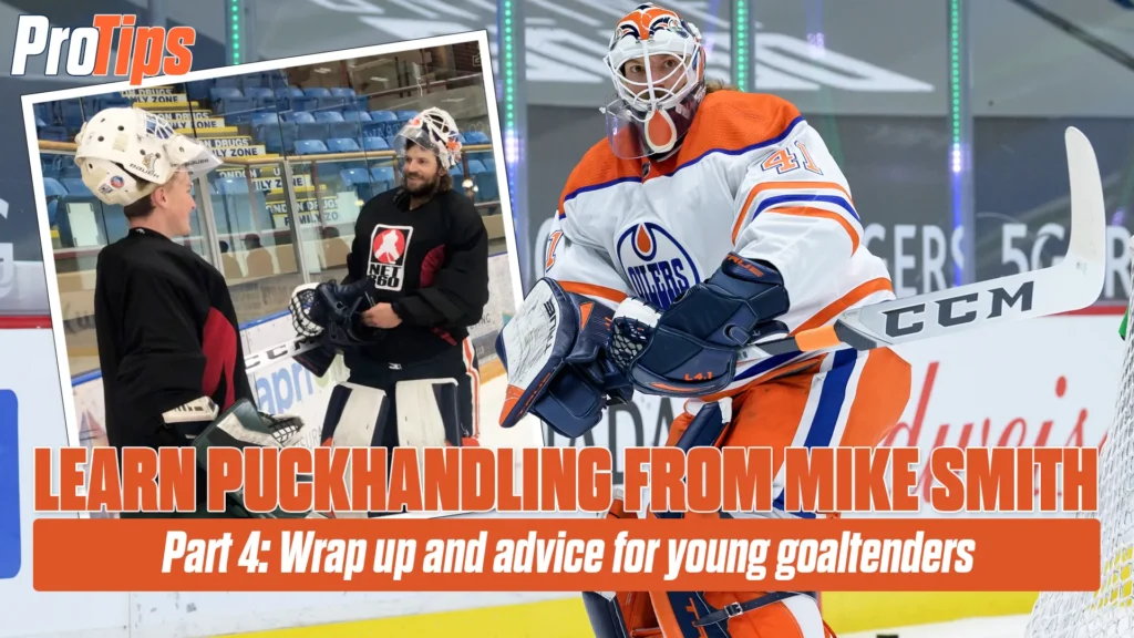 Edmonton Oilers goalie Mike Smith in full gear smiles during a puckhandling lesson with young goaltenders on the ice.