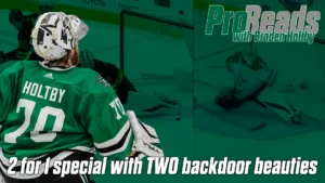 Braden Holtby in Dallas Stars green jersey makes a desperation stick save on a backdoor attempt, fully extended across the...