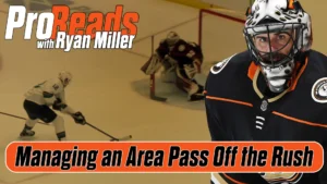 Ryan Miller in Anaheim Ducks gear set in butterfly position as overhead view shows rush play development in Pro Reads inst...