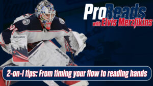 Elvis Merzlikins in Columbus Blue Jackets gear in ready stance, glove raised, for Pro Reads 2-on-1 tips series