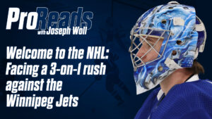 Joseph Woll in Maple Leafs blue mask, profile view, featured in Pro Reads series on facing a 3-on-1 rush