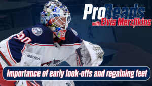 Elvis Merzlikins in Columbus Blue Jackets gear in butterfly position, demonstrating early look-offs and regaining feet tec...