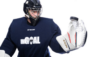 Goalie Matty demonstrates CCM AXIS 2 catching glove in studio, wearing CCM gear and InGoal Magazine practice jersey
