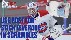 Montreal Canadiens goalie Jake Allen in butterfly position using post for stick leverage during a scramble situation