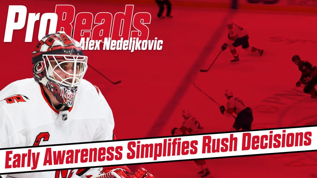 Alex Nedeljkovic in white Carolina Hurricanes gear sets in butterfly stance during a rush drill in ProReads analysis graphic