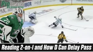 Braden Holtby in Dallas Stars gear tracks a 2-on-1 rush, positioned in crease as defenders attempt to delay the pass.