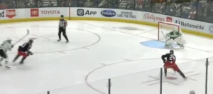 Braden Holtby set in crease as two Columbus Blue Jackets attackers enter zone on a 2-on-0 breakaway
