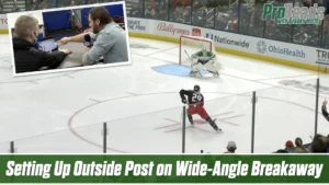 Braden Holtby sets up at the outside post in his blue Columbus Blue Jackets gear during a wide-angle breakaway