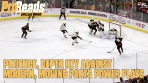 Linus Ullmark in white Bruins gear sets his depth in crease as Carolina Hurricanes power play cycles puck around zone