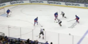 Jaroslav Halak tracks a 3-on-2 rush in his crease, watching for backdoor pass as Rangers defenders challenge attackers at ...