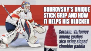 Sergei Bobrovsky in butterfly stance showing unique stick grip with Florida Panthers equipment visible