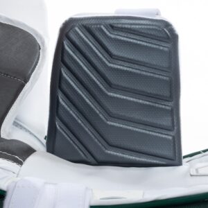 Close-up of CCM Eflex 4 goalie leg pad showing textured 3D moulded knee landing area in dark grey