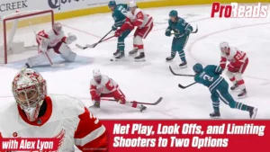Detroit Red Wings goalie Alex Lyon in butterfly position making a save during net play drill