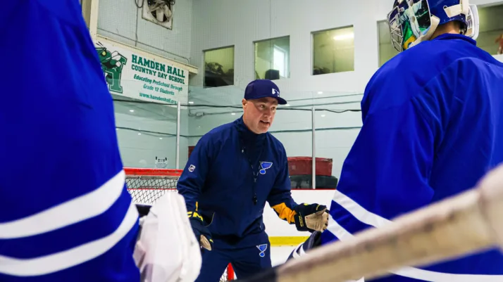 Connecticut Crease goalie coach instructing young goaltenders during an on-ice training session in Northford, CT.