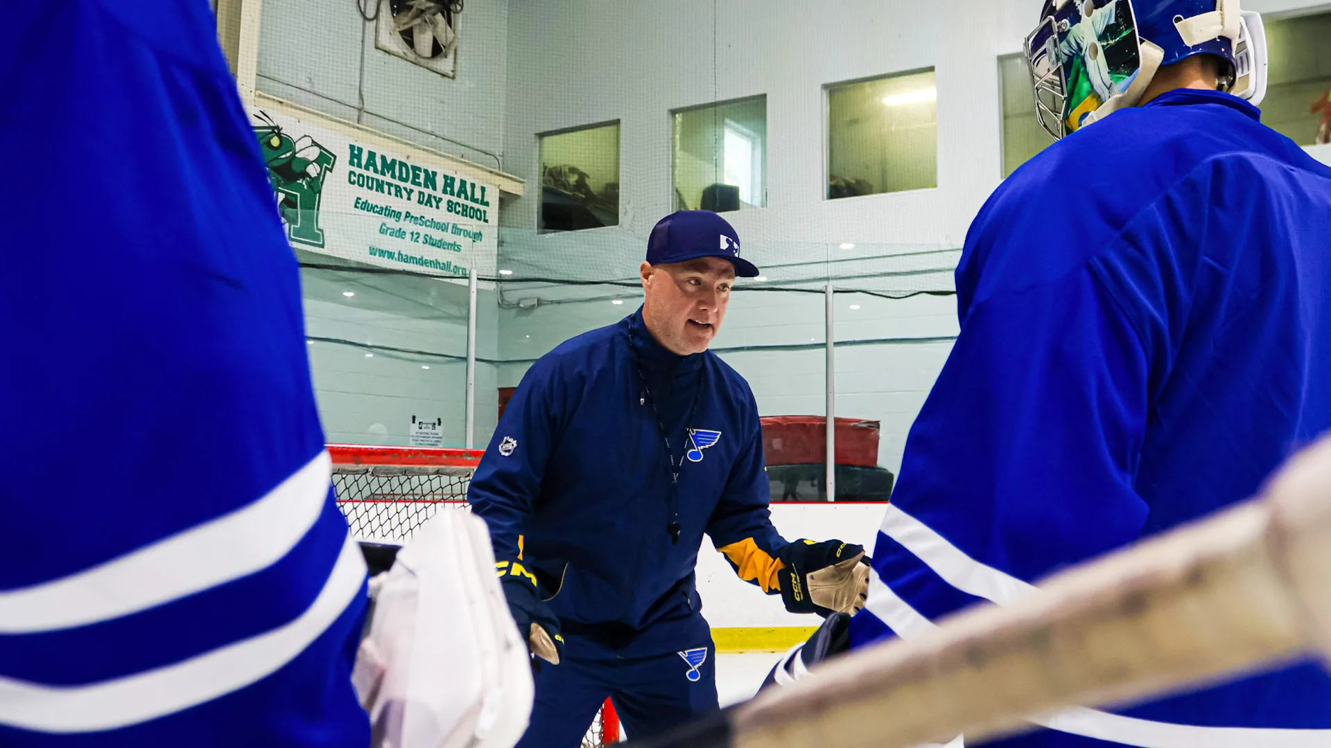Connecticut Crease goalie coach instructing young goaltenders during an on-ice training session in Northford, CT.