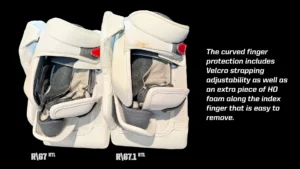 Warrior G7 blocker detail showing curved finger protection with Velcro strapping and HD foam on index finger