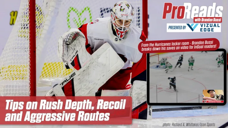 Brandon Bussi makes a save in tight, challenging rush depth and recoil positioning in white pads