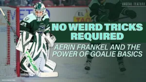 Aerin Frankel wearing green PWHL goalie equipment, poised in crease during game action