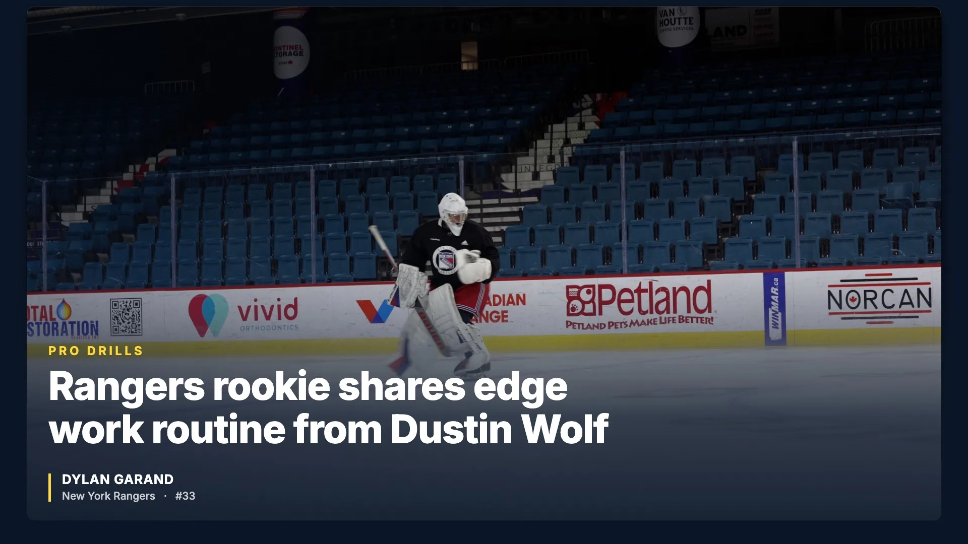 Rangers goalie Dylan Garand performs edge work skating drills on empty ice during a practice session in full gear.
