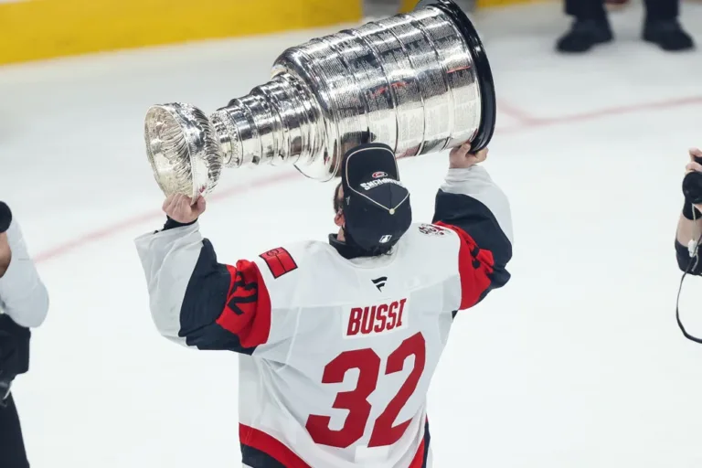 Brandon Bussi hoists the Stanley Cup