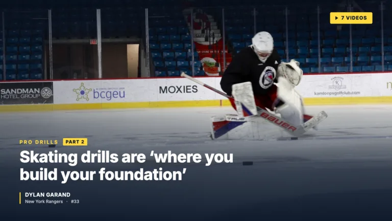 Dylan Garand in Columbus Blue Jackets gear practicing skating drills on ice, in a low athletic stance during off-season tr...