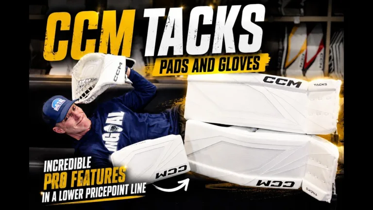 CCM Tacks 2026 goalie pads, blocker, and glove displayed with reviewer holding the white and gold equipment