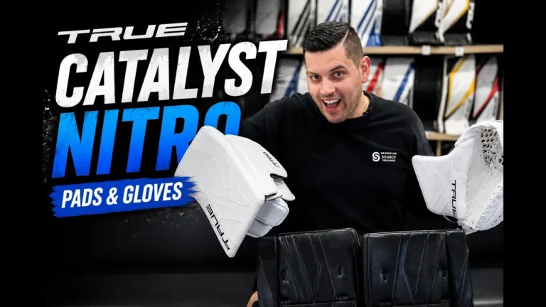 TRUE Catalyst Nitro goalie pads and gloves displayed by InGoal reviewer against branded backdrop