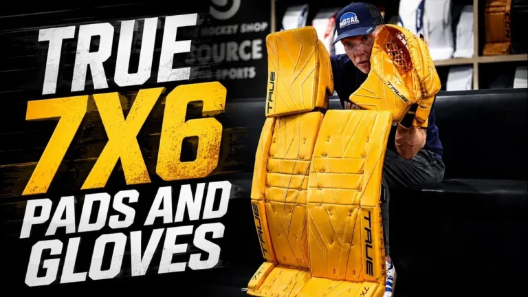 True Catalyst 7X6 goalie pads and blocker displayed in bright yellow, held up for review comparison