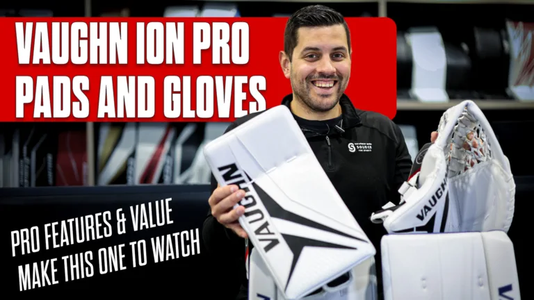 Reviewer holding Vaughn ION Pro goalie pads and gloves during equipment review for InGoal Magazine