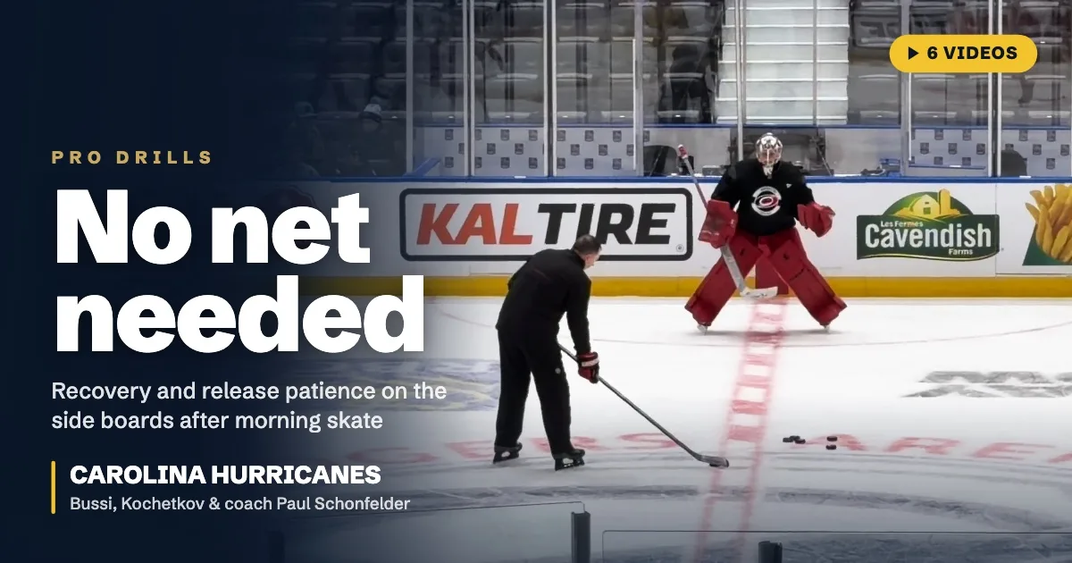 Carolina Hurricanes goalie Pyotr Kochetkov in stance as coach sets up pucks along the boards during a no-net morning skate...