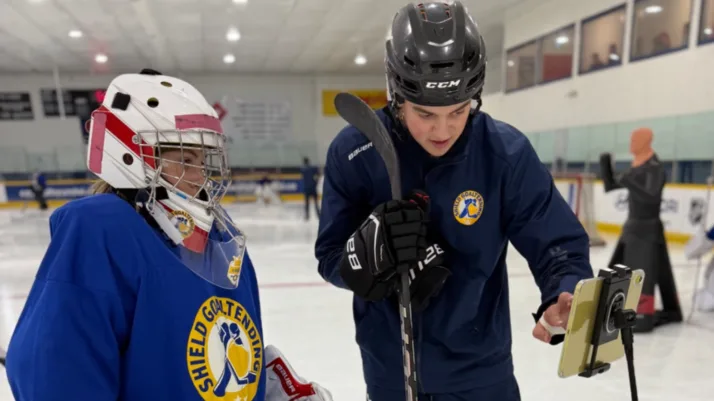 Shield Goaltending coach reviews technique with young goalie during on-ice session in St. John's, NL