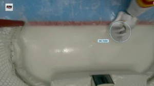 Overhead net camera shows the puck under Devin Cooley's white glove, past the goal line