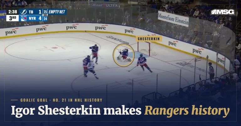 Igor Shesterkin on his knees after shooting the puck the length of the ice into Tampa Bay’s empty net at Madison Square Garden