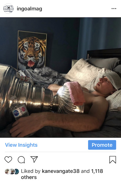 Binner in bed with cup